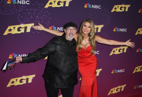 Heidi Klum posing with Richard Goodall